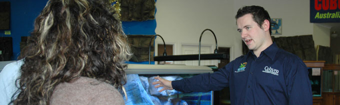 Ian helps a customer